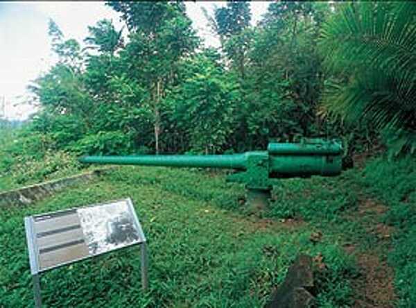 The Piti Guns unit of the War in the Pacific National Historical Park is the site of three Vickers type Model 3 140mm coastal defense guns. During the Japanese occupation of Guam from 1941-1944, the Chamorro population was forced to work in building up these defenses. Photo courtesy of the US National Park Service.