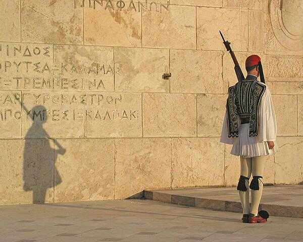 An Evzone (member of the Presidential Guard) at the Tomb of the Unknown Soldier in Syntagma Square, Athens.