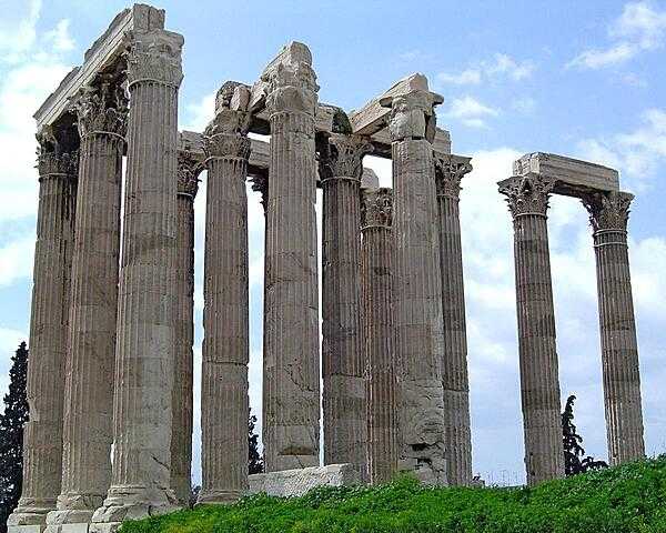 Thirteen of the columns of the Temple of Olympian Zeus (Olympieion) in Athens. Originally, 104 columns supported this massive structure, which was begun in 520 B.C. but not fully completed until A.D. 132!
