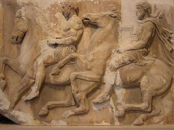 Sculpted processional riders from the marble frieze of the Parthenon.