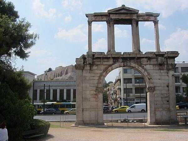 Hadrian&apos;s Arch in downtown Athens was built in A.D. 131 or 132 to honor the Roman Emperor Hadrian, possibly for restoring much of the city and completing the nearby Temple of Olympian Zeus. The Parthenon and Acropolis can be seen in the left background.