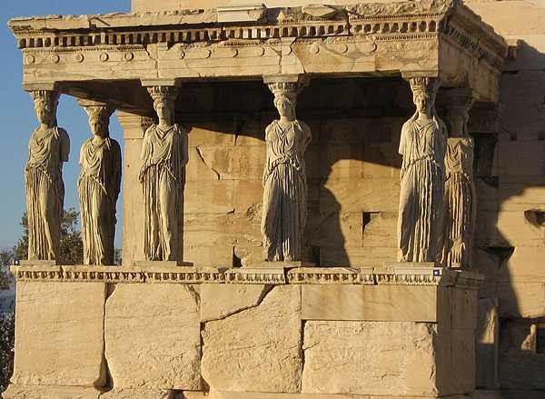 A closer view of the "Porch of the Maidens." The three figures on the left stand on their right knee, while the three on the right stand on their left knee.