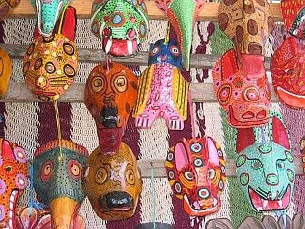 Indian masks at an open-air market.