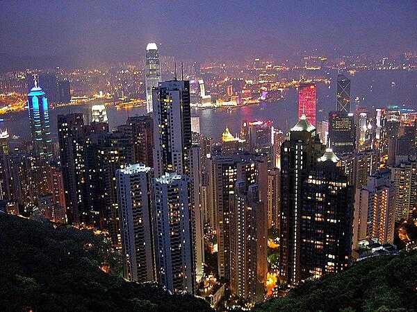 A nighttime view of part Hong Kong viewed from Victoria Peak. Hong Kong has the largest number of skyscrapers of any city in the world (482 as of January 2021; a skyscraper is defined as a continuously-habitable building that has more than 40 floors and is taller than approximately 150 m (492 ft)). By comparison, third-ranking New York City "only" has 290 skyscrapers.