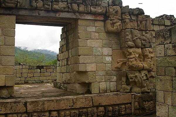 Entrance way with carvings at a  Maya archaeological site at Copán in western Honduras. The site functioned as the political, civil and religious center of the Copán Valley and was composed of a main complex with several secondary complexes. Copán was declared a UNESCO World Heritage Site in 1980.