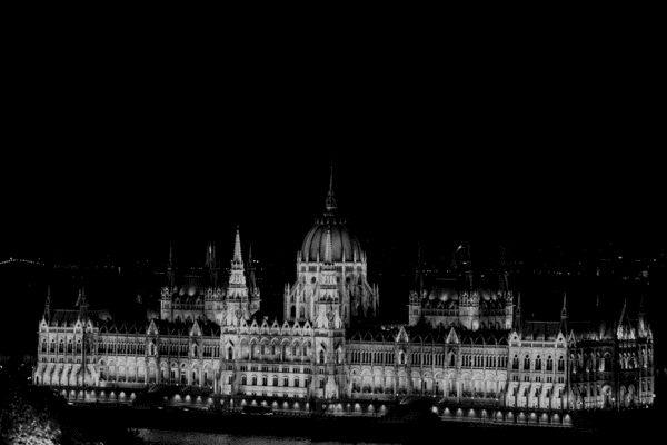 The Hungarian Parliament Building is situated on Kossuth Square in the Pest side of the city, on the eastern bank of the Danube. It was designed by Hungarian architect Imre Steindl in neo-Gothic style and completed in 1904. It is still the largest building in Hungary. Standing 96 m (315 ft) high, it is one of the two tallest buildings in Budapest, along with Saint Stephen's Basilica. The height number of 96 refers to the nation's millennium, 1896, and the conquest of the Kingdom of Hungary in 896. The main façade overlooks the River Danube, but the official main entrance is from the square on the east side of the building.
