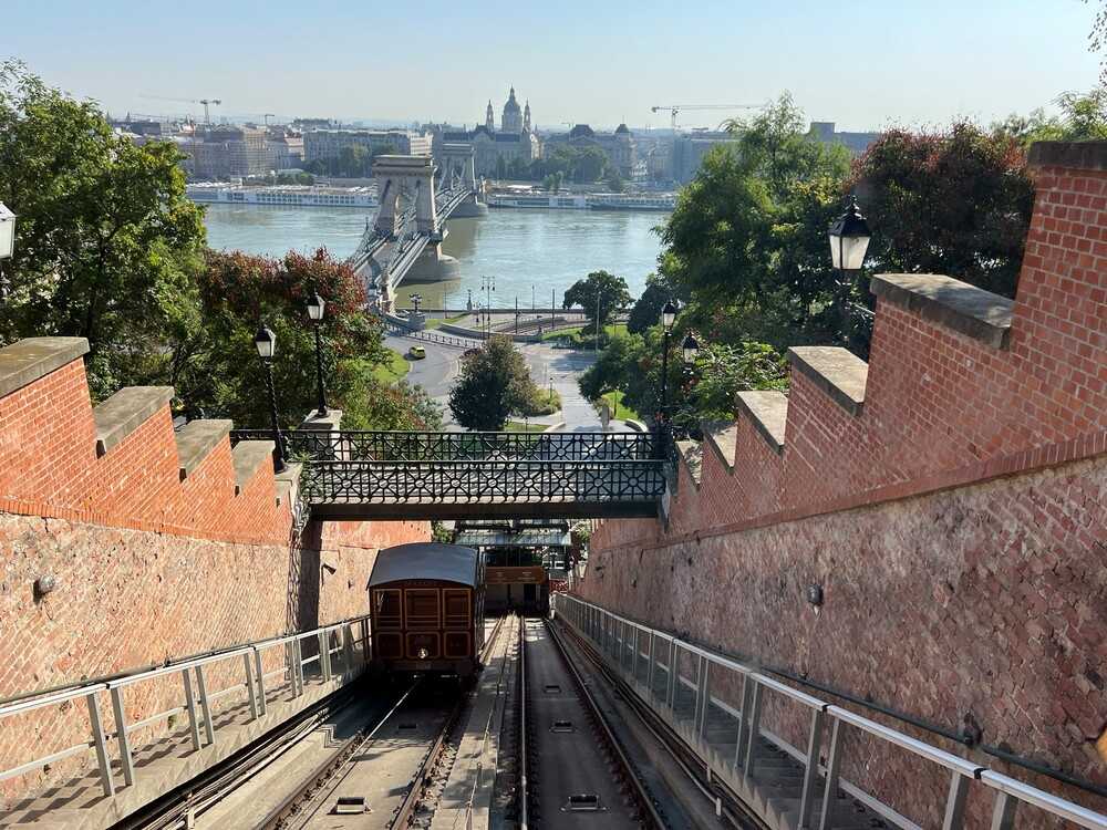 The Budapest Castle Hill Funicular opened in Budapest, Hungary, in 1870. A funicular railway (sometimes called an “incline”) runs on an electric motor, with one car ascending as a second car descends and acts as a counterbalance. The Budapest incline was among the first funiculars in the world and provides easy access to government offices and the Castle Theatre. During World War II, the railway was destroyed, but it was later rebuilt and reopened in 1986. A year later, Budapest -- including the banks of the Danube River, the Buda Castle Quarter, Andrássy Avenue, and the Budapest Castle Hill Funicular -- was named a UNESCO World Heritage Site.