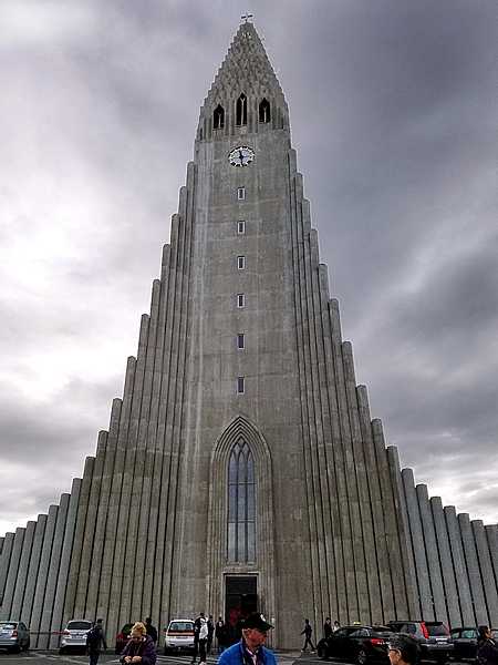 Hallsgrimskirkja is a Lutheran church in Reykjavik that built between 1945 and 1986. The church, with its spire of 74.5 m (244 ft),  is one of the tallest buildings in Iceland and the tallest church in the country. The unusual design of the building was inspired by Iceland’s volcanoes and resembles a gigantic stalagmite of petrified lava residue