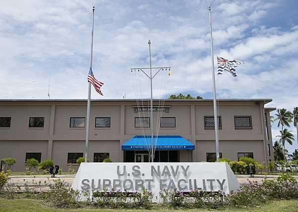 The main administration building for US Navy Support Facility (NSF) Diego Garcia. The US and British Indian Ocean Territory flags are flown at half-mast on 11 September to mark an anniversary of the terrorist attacks on the US. NSF Diego Garcia provides logistic, service, recreational, and administrative support to US and Allied Forces forward deployed to the Indian Ocean and Arabian Gulf. Photo courtesy of US Navy/ Mass Communication Specialist 2nd Class Charlotte C. Oliver.