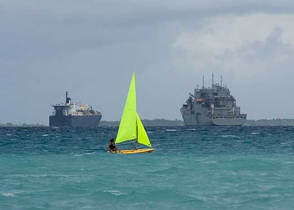A relaxing sail on the lagoon of Diego Garcia. The island is a strategic joint UK and US air and naval base in the Indian Ocean. The lagoon provides a sheltered anchorage for forward deployed naval assets. Diego Garcia provides critical logistical infrastructure support to US and Allied Forces forward deployed to the Indian Ocean and Arabian Gulf. Photo courtesy of the US Navy.