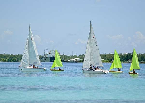 Personnel at the US Navy Support Facility Diego Garcia compete in a sailing regatta. The island lagoon offers an ideal sheltered location for sailing small boats as well as other water sports. Photo courtesy of the US Navy/ Mass Communication Specialist 3rd Class Caine Storino.