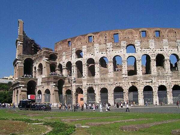 The Colosseum ruins from the outside in Rome. Despite its run-down state, the building remains an iconic symbol of Imperial Rome and is one of the most popular tourist attractions in the world.