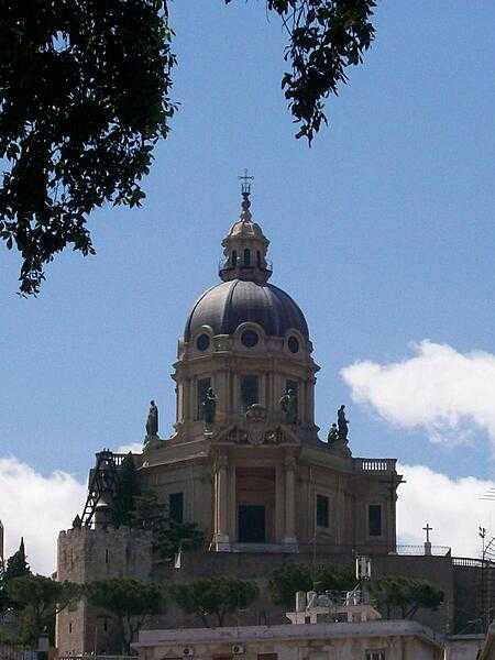 The Santuario di Cristo Re (Sanctuary of Christ the King) in Messina, Sicily was built in 1937 after previous constructions on the same site were destroyed by two earthquakes. The edifice has a commanding view of the city and the port.