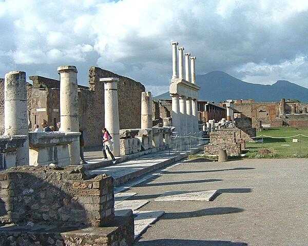 The forum at Pompeii with Mt. Vesuvius in the background.
