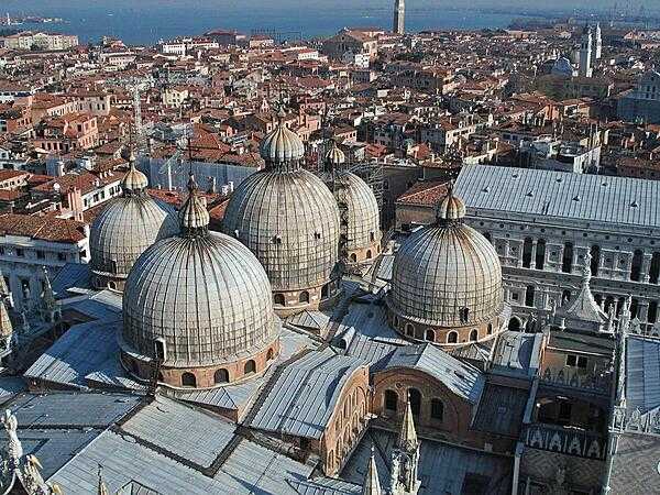 Looking down on St. Mark&apos;s Cathedral in Venice from the campanile (bell tower).