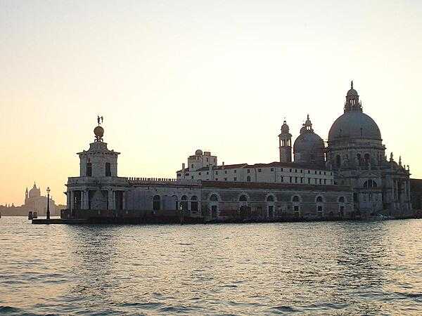 A view of the Basilica di Santa Maria della Salute (Basilica of St. Mary of Health) in Venice, a church constructed as a votive offering for the city&apos;s deliverance from a particularly devastating plague in 1630. Construction began in 1631 but was not completed until five decades later, in 1681.