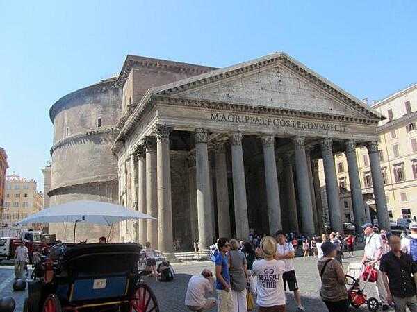 The Pantheon in the Plaza della Rotonda in Rome. Its current form dates from about A.D. 126 when the Emperor Hadrian rebuilt it over Marcus Agrippa&apos;s original temple dating from 27 B.C. The temple was dedicated to the classical gods. The name comes from the Greek words pan (all) and theos (god). The Pantheon has been a Christian church since about 608.