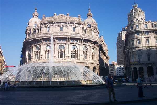 View of the east side of the Piazza de Ferrari, the main square of Genoa. The huge plaza is renowned for its beautiful fountain, behind which is the Palace of the New Stock Exchange. Photo courtesy of NOAA / Michael Theberge.