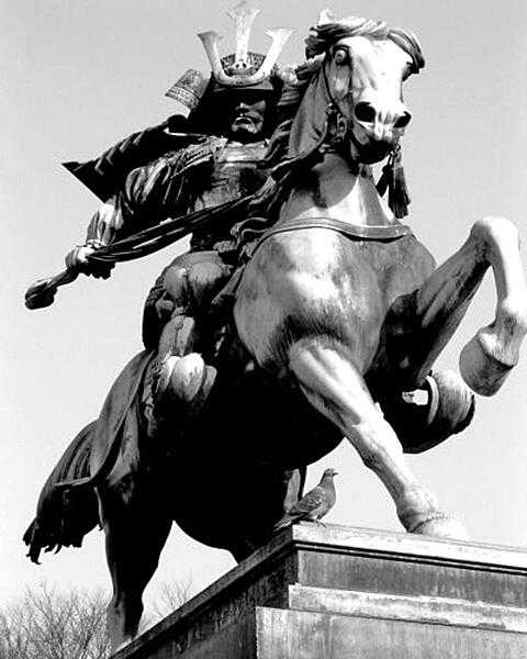 Equestrian statue of the famous samurai Kusunoki Masashige (1294-1336) outside of the Imperial Palace in Tokyo.
