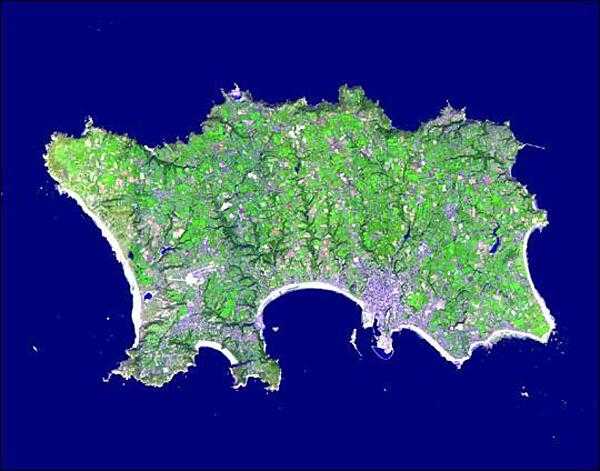 The Isle of Jersey (officially called the Bailiwick of Jersey) is the largest of the Channel Islands in the Bay of Mont St. Michel off the northwest coast of France. This Terra satellite image vividly displays the island&apos;s agricultural patchwork terrain. Image courtesy of NASA.
