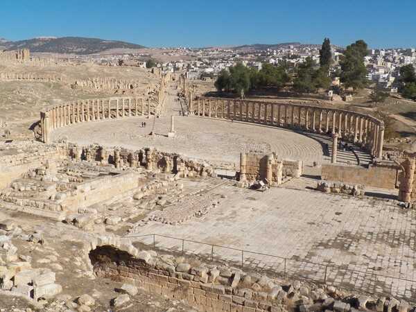 The Forum was the center of civic life in every ancient Roman city. The columns in the Forum of ancient Jerash (known as Gerasa in Roman times) would have supported a roof, providing a shaded arcade for the public.