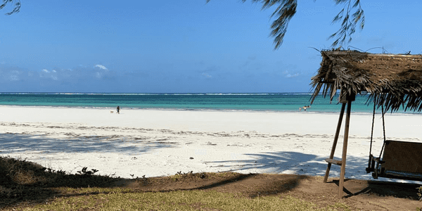 Diani Beach, on the Indian Ocean coast, is some 30 km (19 mi) south of Mombasa. The beach, about 17 km (11 mi) long, is one of the most prominent tourism resort areas of Kenya. The water remains shallow near shore, allowing visitors to wade with a clear view of the sandy bottom.