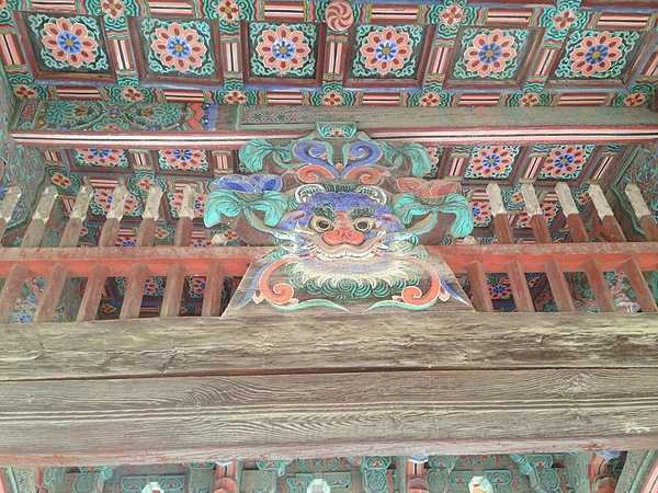 Detail of some of the elaborate carving and painting at Bulguksa Temple.