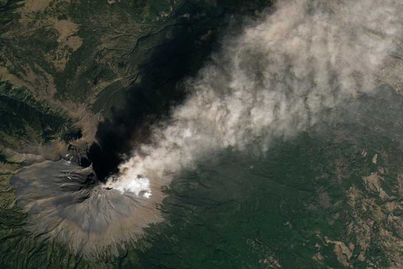 Mexico's towering and unpredictable Popocatepetl is the country's most-active volcano and second-highest peak. The 5,462 m stratovolcano, located approximately 70 km (43.5 miles) southeast of Mexico City, is shown spewing ash, smoke, and gas during a January 2024 eruption.  Popocatepetl means "Smoking Mountain" in the indigenous Nahuatl language.  Photo courtesy of NASA.