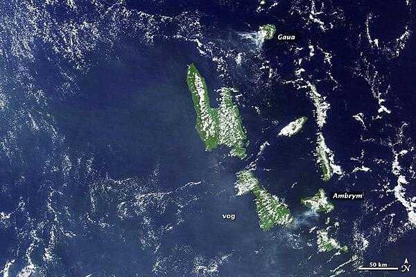 A higher-resolution view of the previous Vanuatu Archipelago image showing the two active volcanoes of Gaua and Ambrym. Vanuatu&apos;s two major islands of Espiritu Santo (top) and Malakula (bottom) appear in the center of the image. Photo courtesy of NASA.