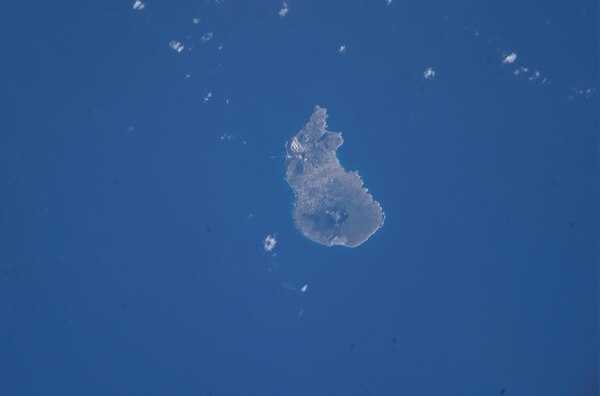 Saint Eustatius is a Caribbean island that is a special municipality of the Netherlands. The island lies in the northern Leeward Islands portion of the West Indies, southeast of the Virgin Islands. This photo was taken from the International Space Station. Image courtesy of NASA.