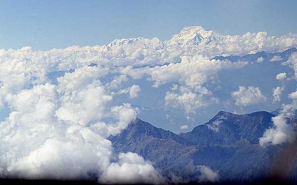 Aerial view of some of the Himalayas with Mount Everest in the distance.