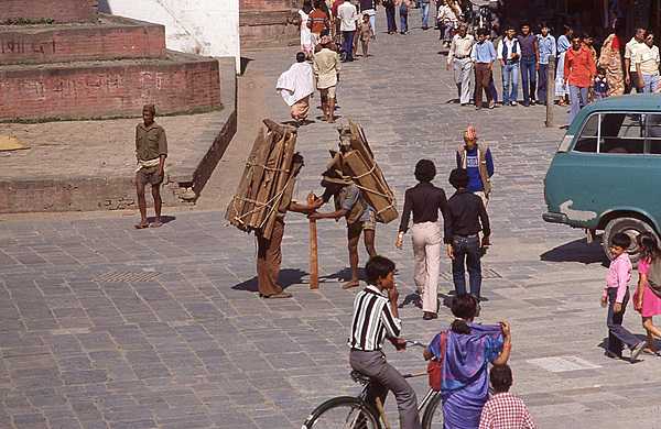 Wood gatherers on a street in Kathmandu.
