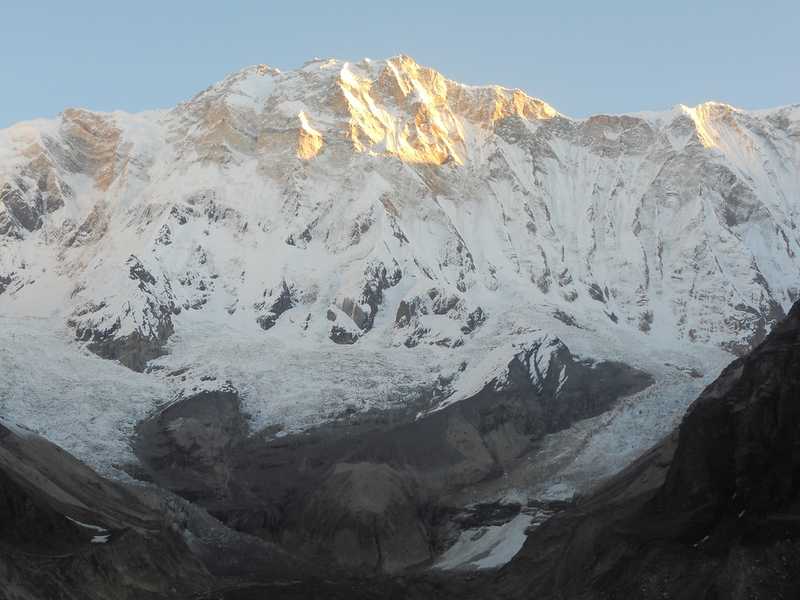 The south face of the Annapurna Massif in the Annapurna Conservation Area. The highest peak of the massif, Annapurna I Main, is the tenth highest mountain in the world at 8,091 m above sea level.