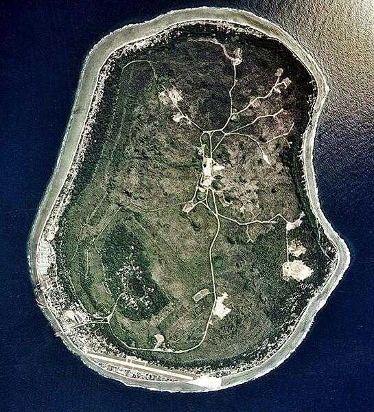 Satellite photo of Nauru vividly displays some of the prominent features of the island including roadways, the landing strip of the international airport in the south, and the Buada Lagoon in the southwest.
Nauru holds the distinction of being the third-smallest country in the world, the smallest country in the Pacific Ocean, the smallest country outside of Europe, the world's smallest island country, and the world's smallest independent republic.  Located 53 km (32 m) south of the Equator, Nauru is one of the three great phosphate rock islands in the Pacific Ocean.  Image courtesy of the US Department of Energy's Atmospheric Radiation Measurement Program.