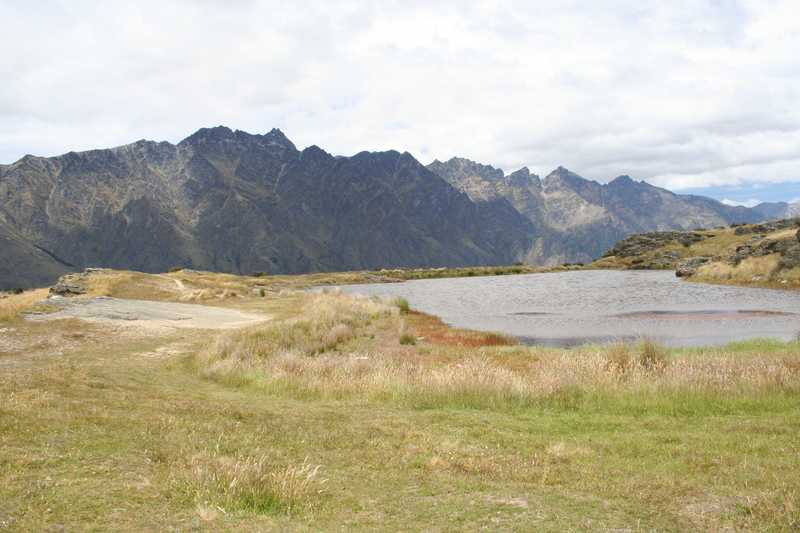 This park pond in hills above Queenstown on the South Island served as the setting for “The Two Towers” pilgrimage scene - part of the "Lord of the Rings" film trilogy. The Remarkables mountain range in the background provides a striking background.