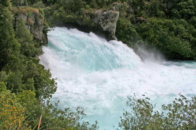 Huka Falls, along the Waikato River on the North Island, is the outlet for Lake Taupo, the largest lake in New Zealand. After surging through a narrow canyon, the river cascades over large falls before winding its way to the sea.