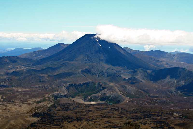 Tongariro National Park is an active volcanic area (and ski resort) on the North Island. The park contains kilometers of hiking trails past all the peaks in the region.