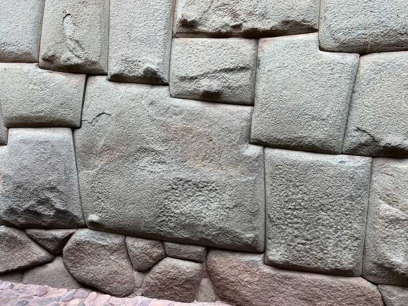 The famous 12-sided stone sits in the center of an Incan-era wall in the heart of Cusco. The joints are so tight, it is impossible to insert anything between the stones.