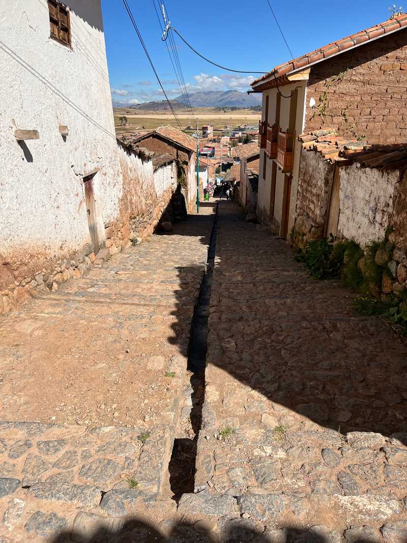 Inca architecture is repurposed in the streets and walls of Chinchero.
