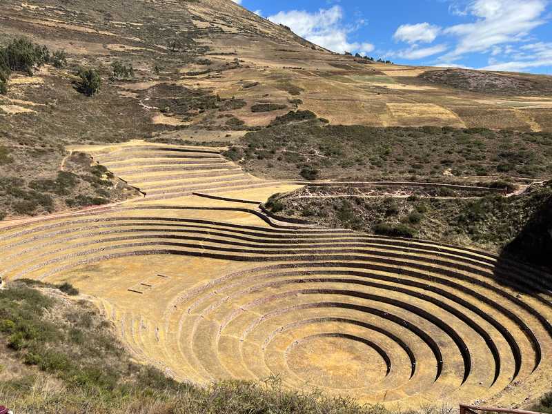 The Moray Terraces, an Inca archaeological site on a high plateau in the Andes, is known for its terraced circular depressions with irrigation systems built by the Inca. Their purpose is unclear, but they may have served as an ancient agricultural research station where the Wari, and later the Inca, experimented with different crops and sun exposure to maximize crop production.