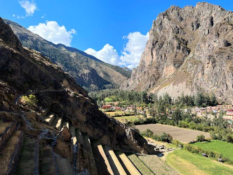 The mountain town of Ollantaytambo sits at a junction of two valleys. Looking up into the Andes, one can see the Incan stone structures used for growing and storing crops.