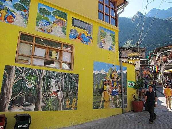 Murals reflecting an area&apos;s history or other subjects of interest to the locals are a common sight in Peru. This mural is in Aguas Calientes.