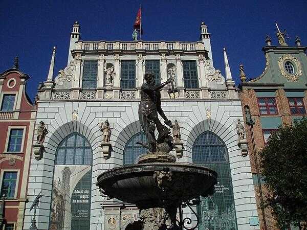 The Neptune Fountain in Gdansk is one of the most recognizable symbols of the city. First erected as a statue in 1549, it was converted into a fountain in 1633. The monument fronts a merchant house near the Town Hall.