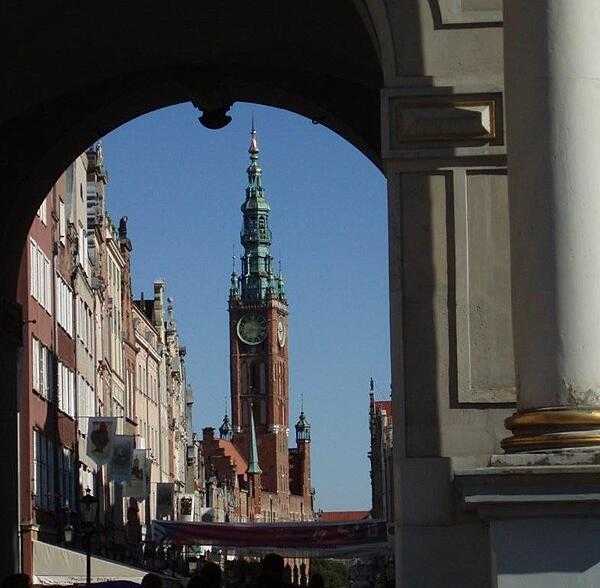 The Town Hall of Gdansk as seen through the arch of the Golden Gate.