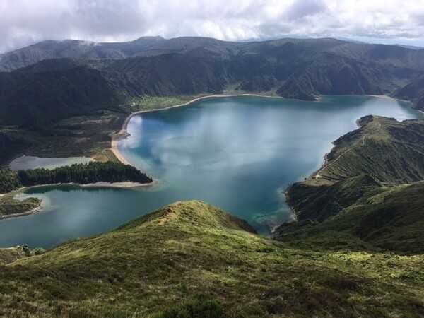 Lagoa do Fogo (Lake of Fire) is a crater lake within the Água de Pau Massif stratovolcano in the center of the island of São Miguel in the Azores archipelago.