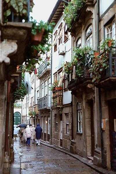 Narrow streets with their window boxes and wrought iron balconies in Madeira.