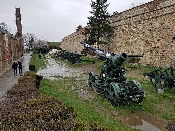 Along the walls of the Kalemegdan Fortress in Belgrade with a display of historic artillery.