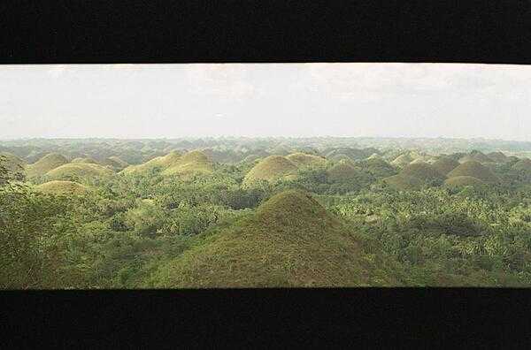 The unusual geological formation known as the Chocolate Hills in Bohol. Almost 1,300 perfectly cone-shaped hills, all about the same size, spread over some 50 square kilometers. The grass covering the hills turns brown during the dry season, giving the hills their name.