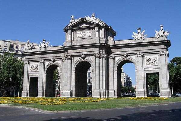 The Puerta de Alcala (Alcala Gate) monument in the Plaza de la Independencia (Independence Square) in Madrid. Inaugurated by King Carlos III in 1778, it originally functioned as an enormous gate in the city&apos;s wall.