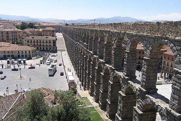 The Aqueduct of Segovia - built of unmortared, granite blocks - is one of the best-preserved Roman monuments on the Iberian peninsula; it provided water to the city until the mid-19th century. The impressive aqueduct is one of the symbols of Segovia and appears on the city's coat of arms.